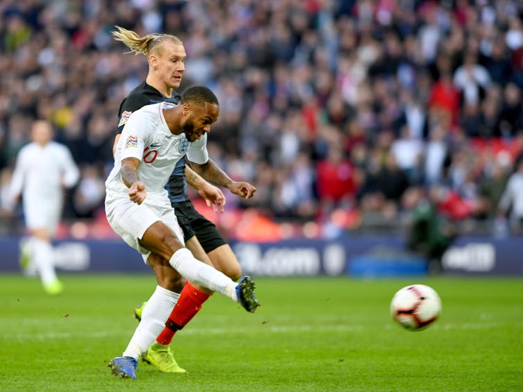 Raheem Sterling shoots a goal in November 2018