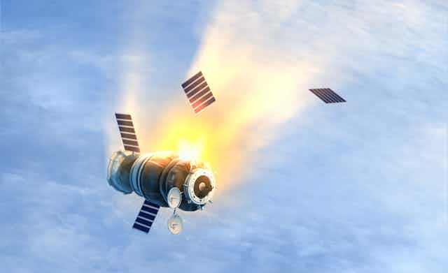 A falling, broken satellite.