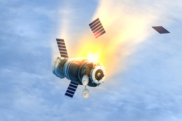 A falling, broken satellite.