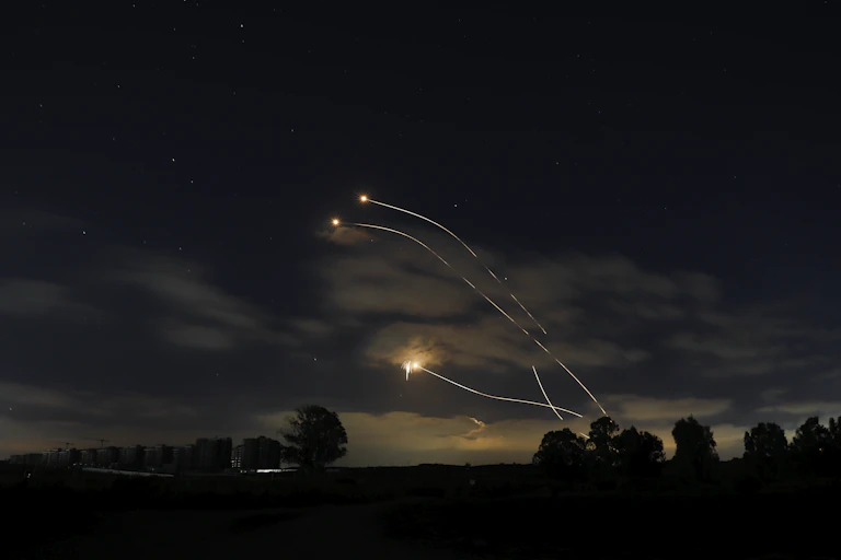 Bright plumes are seen in the night sky