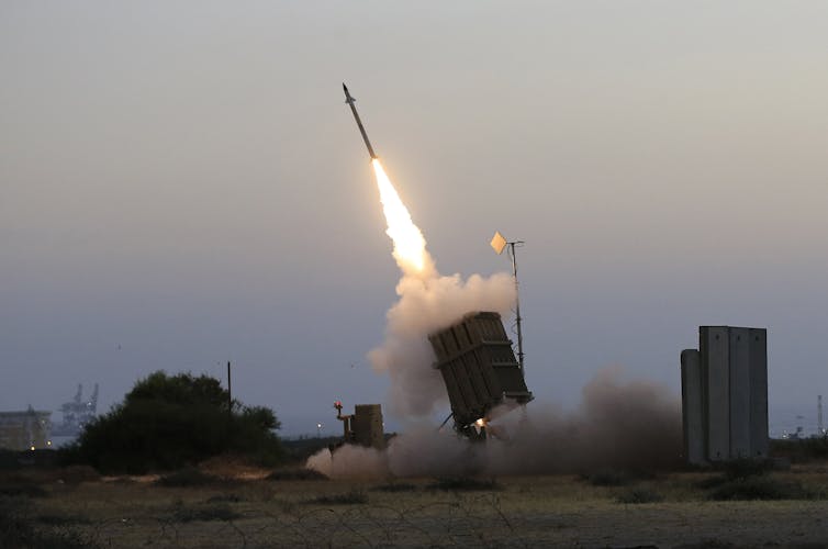 An Iron Dome air defence system fires to intercept a rocket