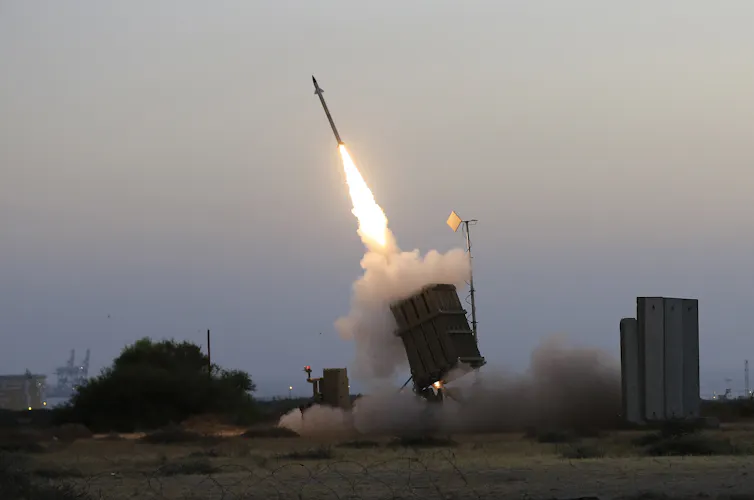 An Iron Dome air defence system fires to intercept a rocket