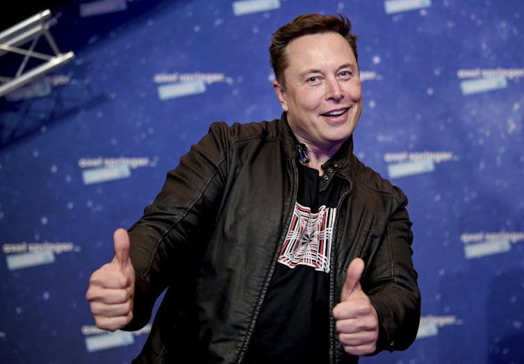 Elon Must giving thumbs up