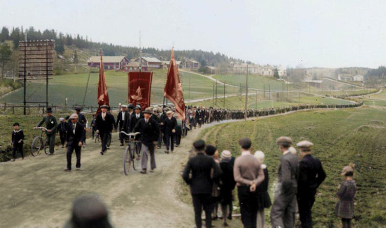 Swedish strikers marching along a country road
