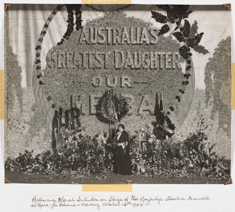 Melba and floral tributes on stage. Backdrop reads 'Australia's greatest daughter, our Melba.'