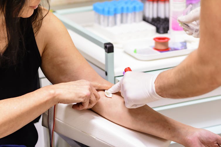 Woman has blood taken for a blood test.