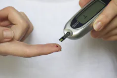 A finger-prick blood sugar monitor