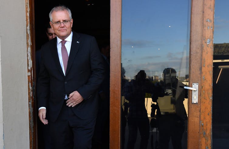 Scott Morrison in a doorway