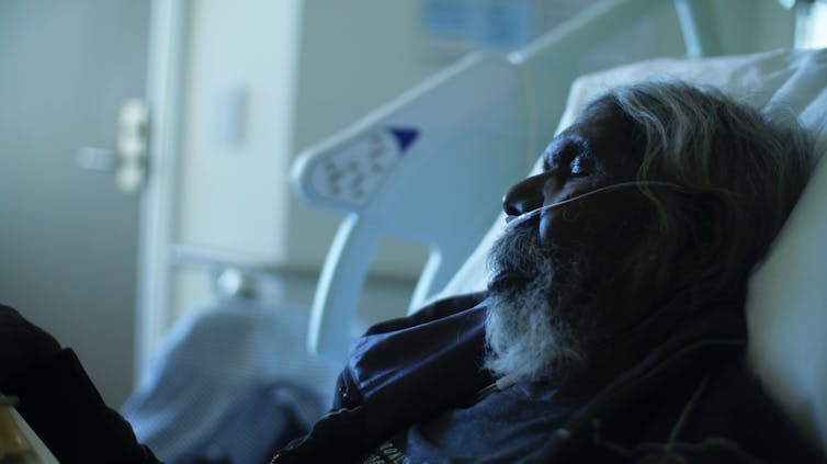 Gulpilil in a hospital bed