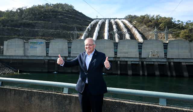 Prime Minister Scott Morrison gives thumbs up at Snowy Hydro