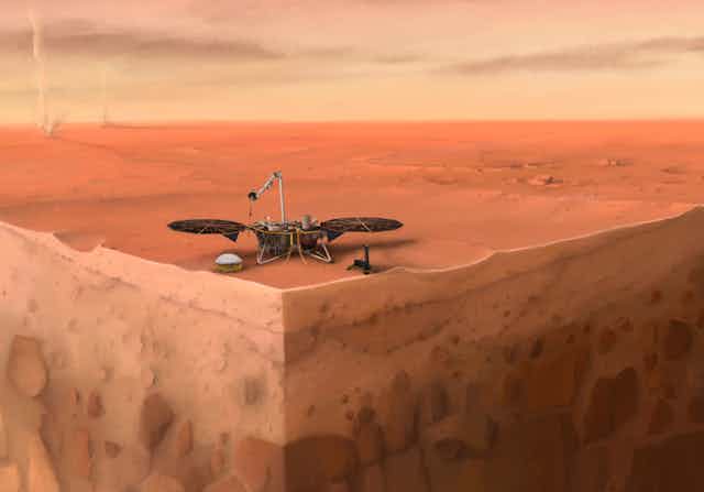In this artist's concept of NASA's InSight lander on Mars, layers of the planet's subsurface can be seen below and dust devils can be seen in the background.