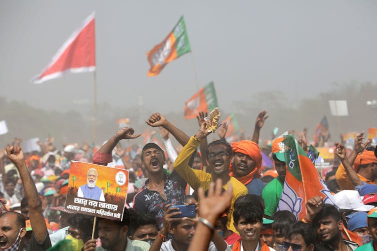 A crowded outdoor political rally in India in March 2021
