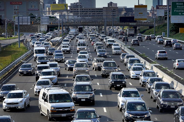 Congested highway with a city in background