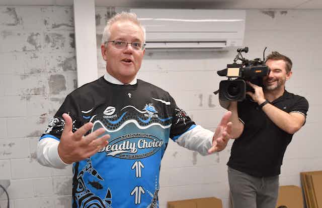 Scott Morrison, wearing a jersey which reads "Deadly Choice"