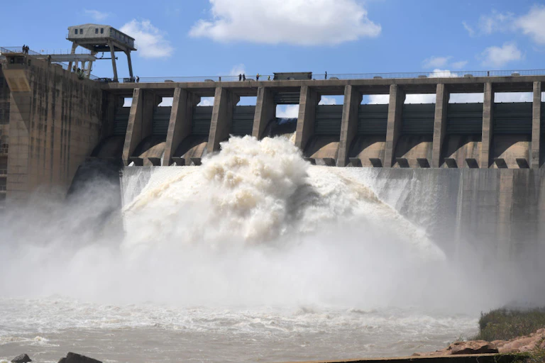 Water flows gushing from sluice gates.
