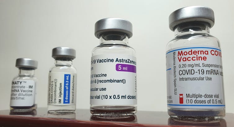 Vials of COVID vaccines from AstraZeneca, Moderna, Pfizer and Johnson & Johnson