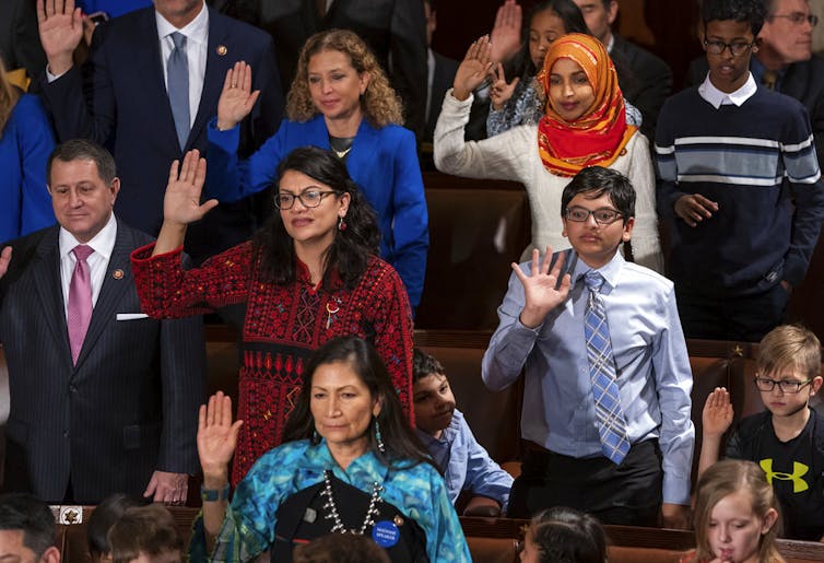 Democratic members of the House of Representatives take their oath on Jan. 3, 2019, the opening day of the 116th Congress, at the Capitol in Washington. AP Photo/J. Scott Applewhite