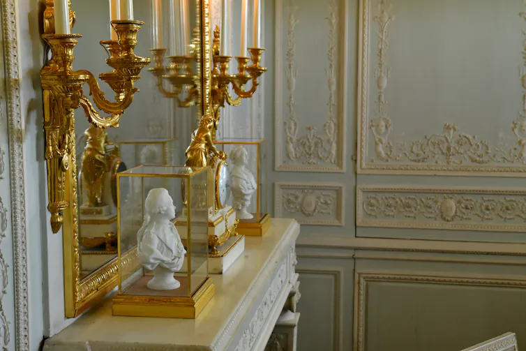 gold mirror and candles