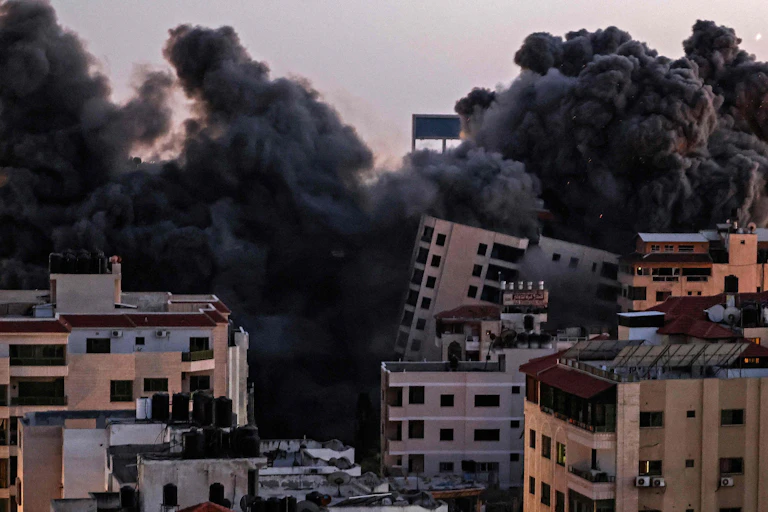 bombed buildings and black smoke in Gaza