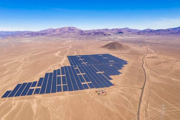 Aerial view of solar panels in the desert