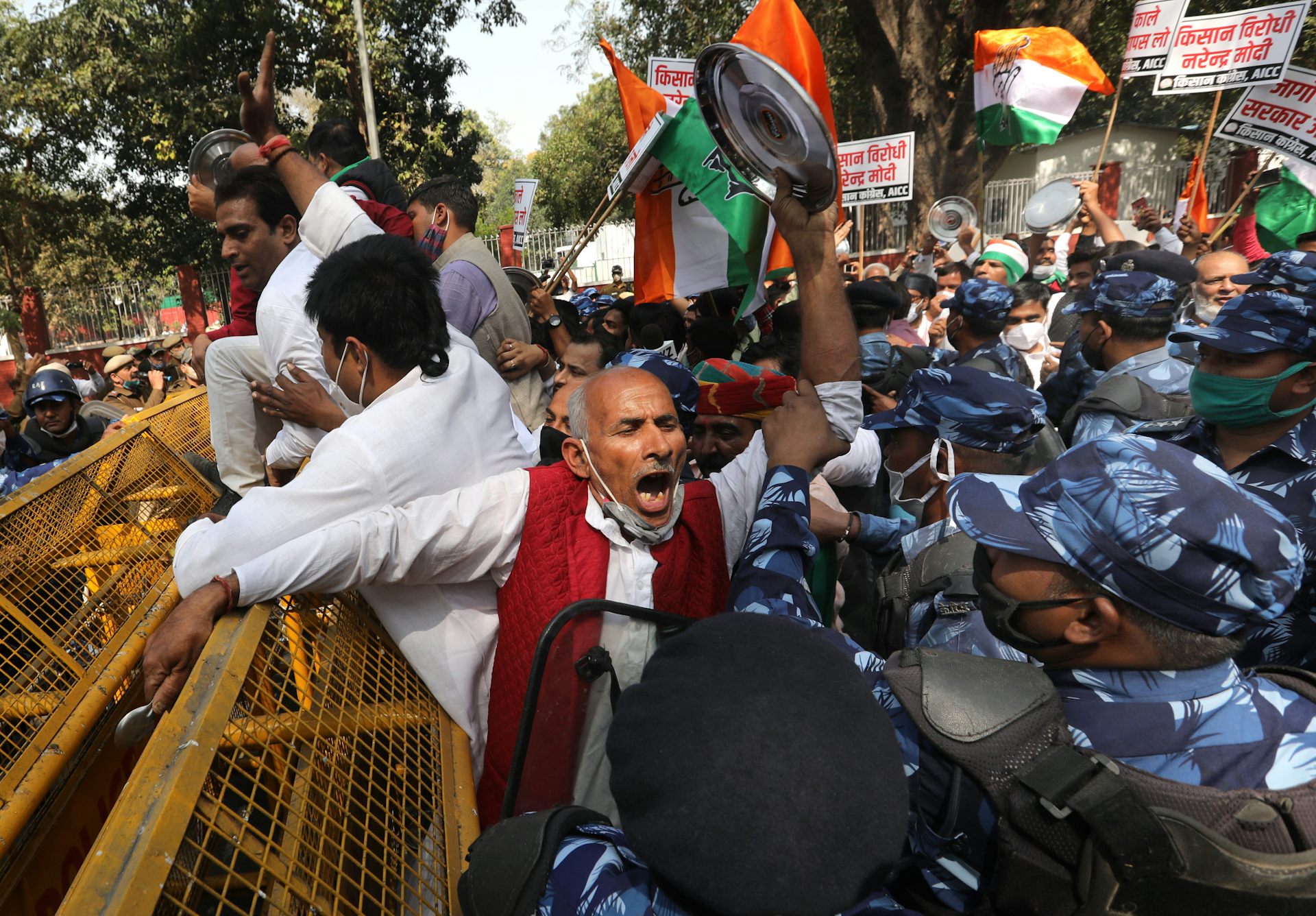 Men with flags meet riot police