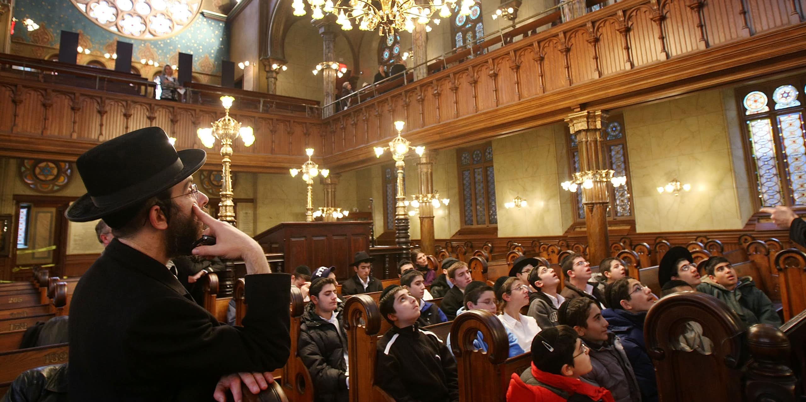 Students admiring the historic Eldridge Street Synagogue in New York City