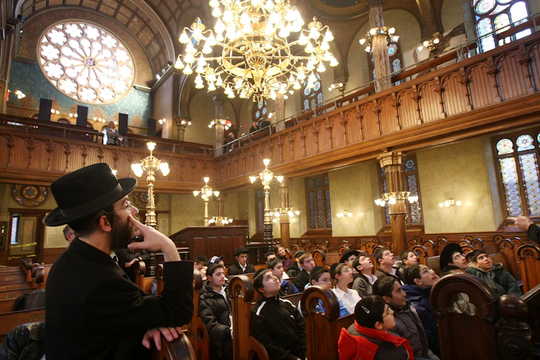 Students admiring the historic Eldridge Street Synagogue in New York City