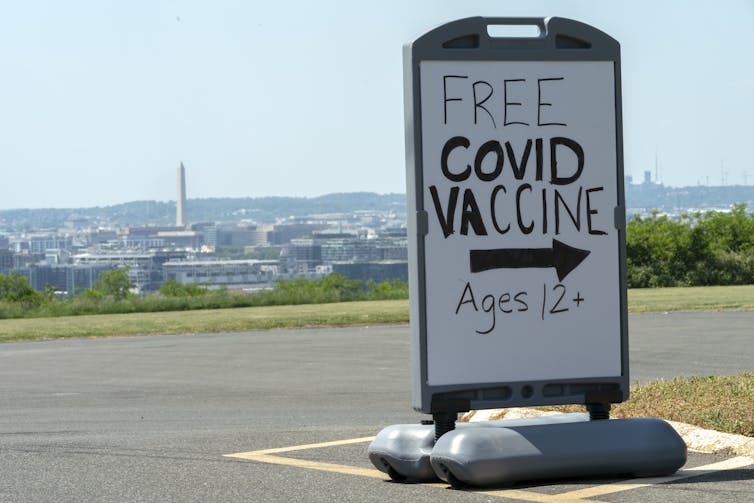 A sign advertising free COVID-19 vaccine for ages 12 and over