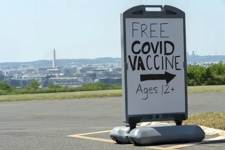 A sign advertising free COVID-19 vaccine for ages 12 and over