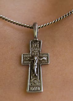A cross around the neck.