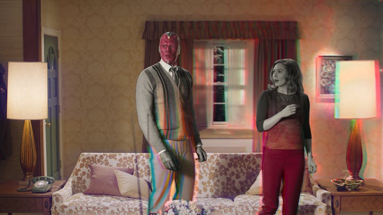 The android superhero Vision and Wanda Maximoff in the Marvel TV series 'WandaVision'
