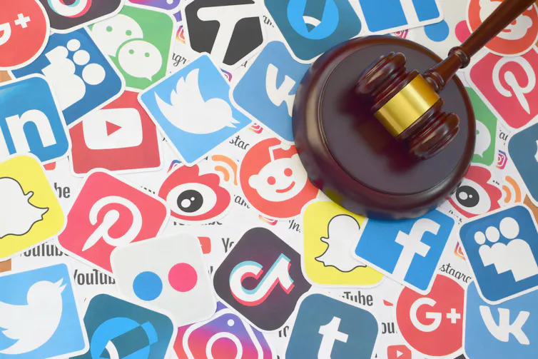 Social media logos like TikTok, Twitter, Reddit, Facebook, Instagram, Tumblr are in a collage with a judges gavel on top