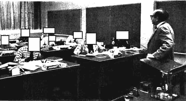 Lambros D. Callimahos teaches his last cryptography class at the NSA, 1976. Students' faces redacted for security reasons.