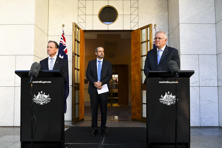 Omar Khorshid, Greg Hunt, and Scott Morrison