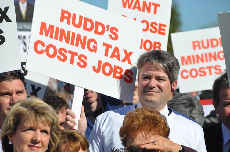 Then WA Liberal senator Mathias Cormann and deputy federal Liberal leader Julie Bishop join protesters in Perth opposing the Rudd government's proposed mining super profit tax in June 2010.