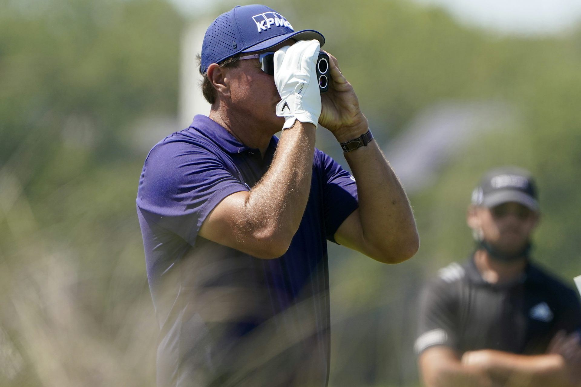 How far away are professional golfers from accepting rangefinders in competition