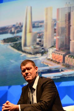 James Packer with an artist's impression of his Crown Casino Barangaroo development proposal at a business function at the Sydney Opera House, May 16 2013.