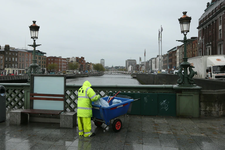 Street cleaner on Dublin's Grattan bridge