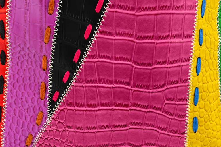 Multicoloured product made of exotic animal leathers