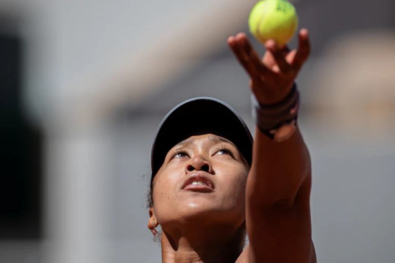 Naomi Osaka gets ready to serve.