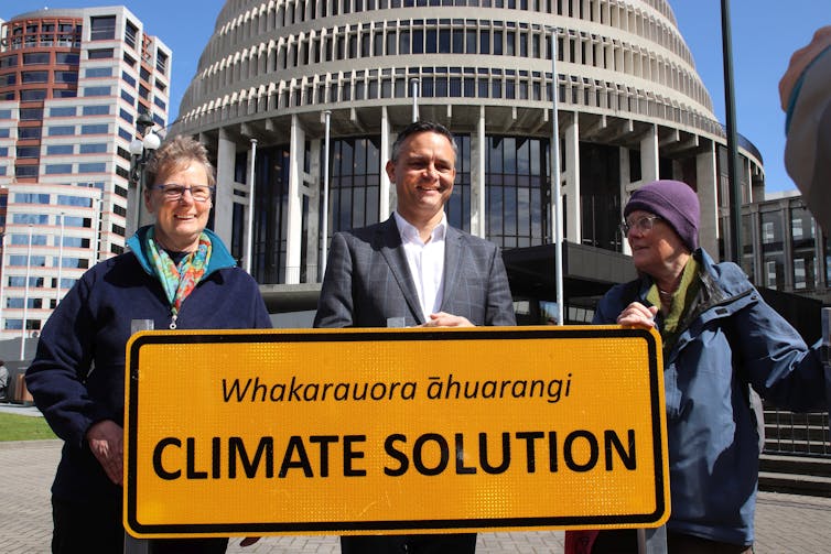 Climate change minister James Shaw and supporters outside parliament