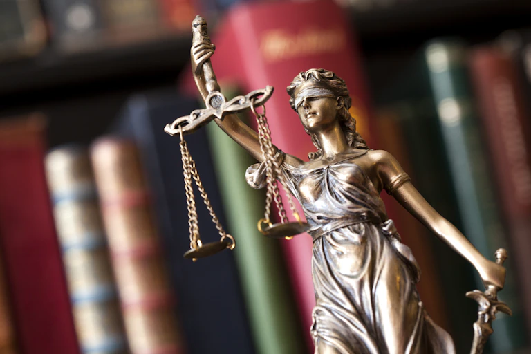 A figurine of Lady Justice.