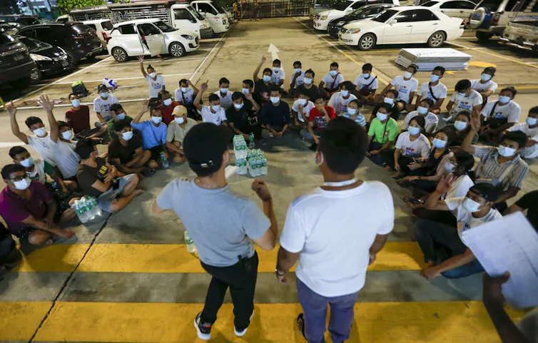 Health volunteers in Myanmar being briefed