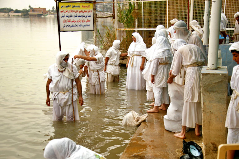 Followers of the Sabean Mandaeans faith, a pre-Christian sect that follows the teachings of the Bible's John the Baptist, perform their rituals in the Tigris River during a celebration marking "Banja" or Creation Feast, in central Baghdad, Iraq, Monday, March 15, 2021.