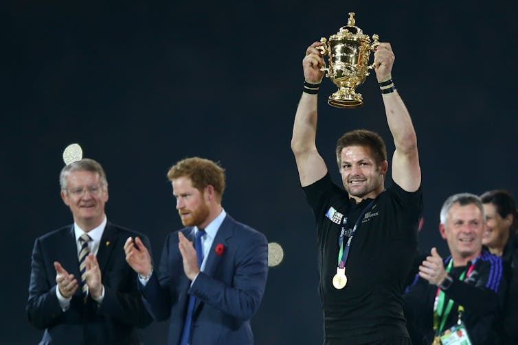 Richie McCaw lifts the Webb Ellis cup at the Rugby World Cup Final in London