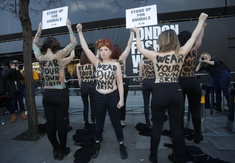 Protesters at London Fashion Week in 2018.