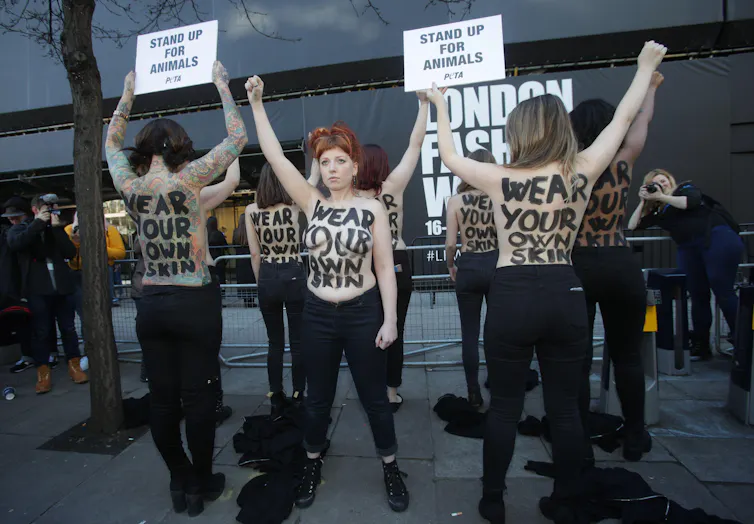 Protesters at London Fashion Week in 2018.