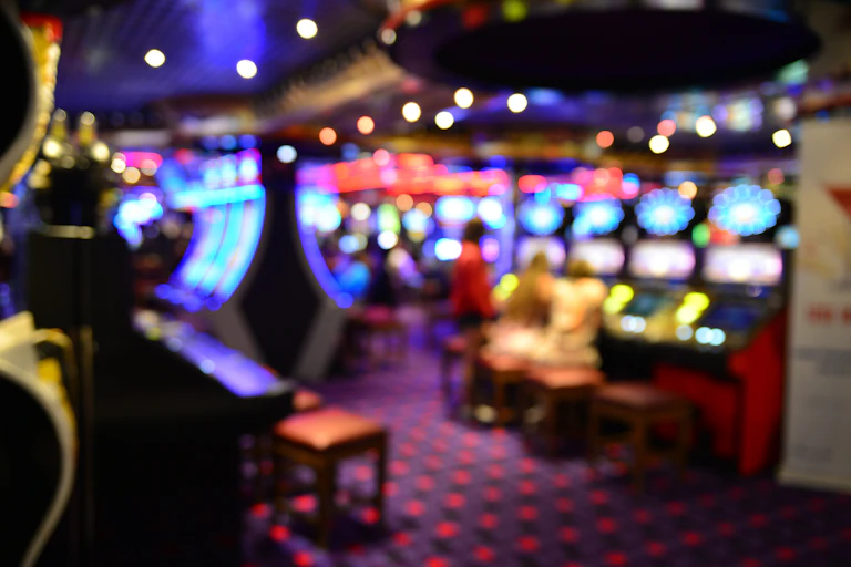Blurred image of poker machines.