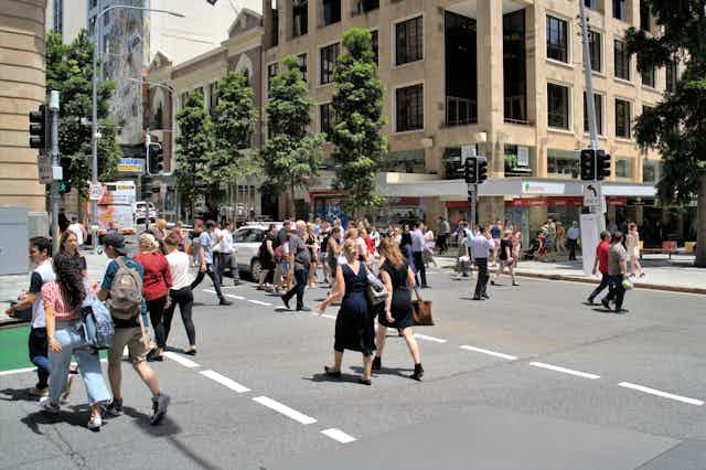 pedestrians crossing city streets