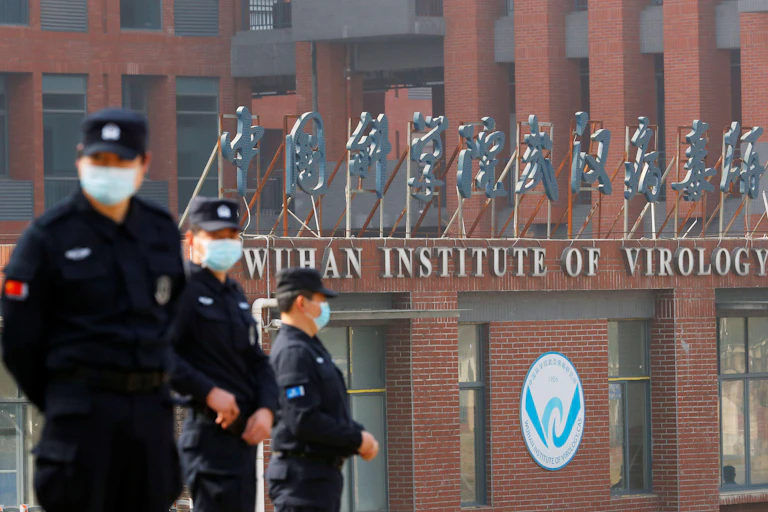 Security personnel keep watch outside Wuhan Institute of Virology
